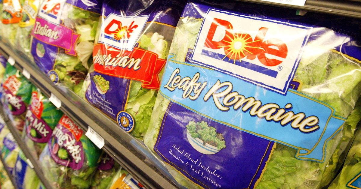 Dole pre-packaged salads sit on a shelf in a grocery store in San Francisco on June 19, 2003.