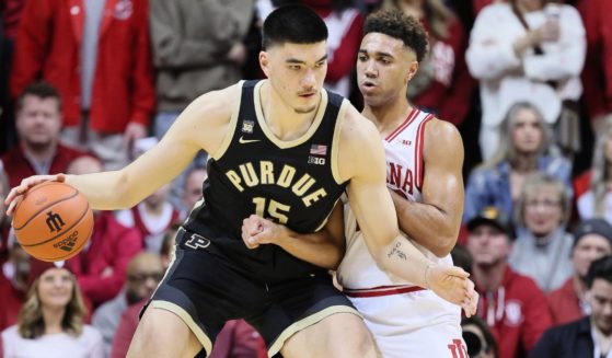 Zach Edey of the Purdue Boilermakers is defended by Trayce Jackson-Davis of the Indiana Hoosiers at Simon Skjodt Assembly Hall in Bloomington, Indiana, on Saturday.