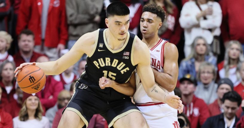 Zach Edey of the Purdue Boilermakers is defended by Trayce Jackson-Davis of the Indiana Hoosiers at Simon Skjodt Assembly Hall in Bloomington, Indiana, on Saturday.
