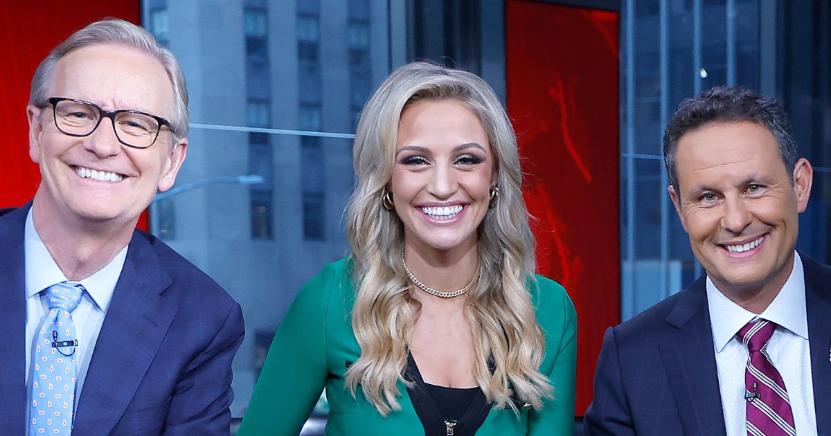 From left, Steve Doocy, Carley Shimkus and Brian Kilmeade host "Fox & Friends" at Fox News Channel Studios in New York City on Sept. 8.