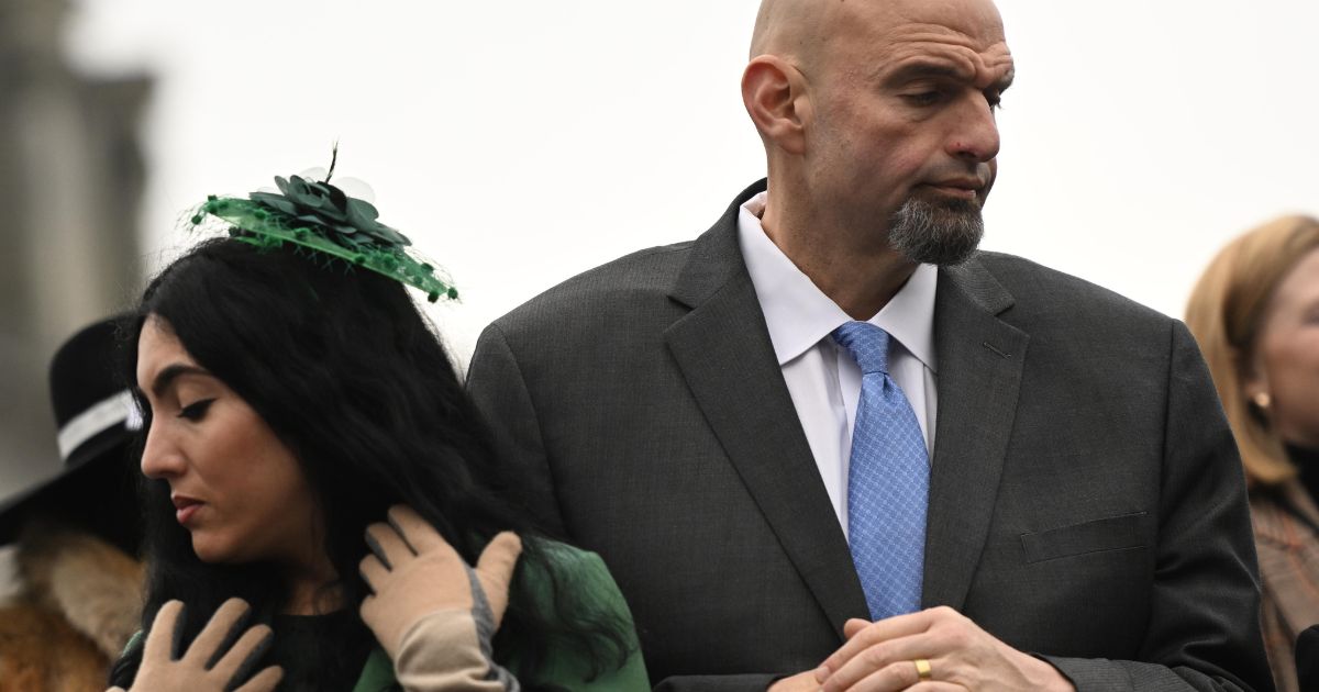 U.S. Sen. John Fetterman and his wife, Gisele Barreto Fetterman, attend the swearing-in of the governor of Pennsylvania on Jan. 17 in Harrisburg, Pennsylvania.