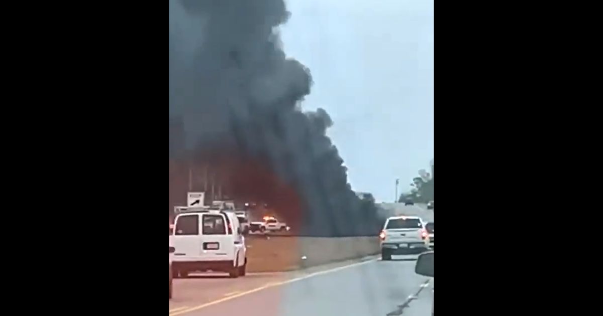 A Tennessee National Guard helicopter tumbled from the sky and exploded in flames in Huntsville, Alabama, on Wednesday.