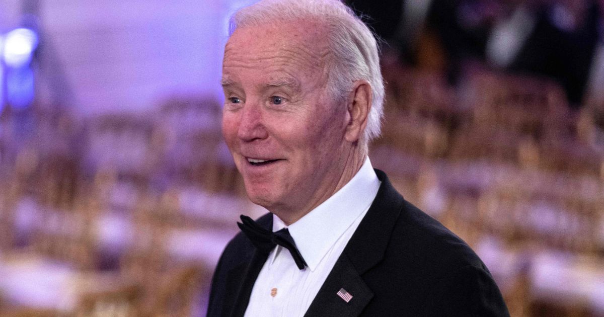 President Joe Biden arrives for the entertainment portion of the evening after a black-tie dinner for governors and their spouses at the White House in Washington, D.C., on Saturday.