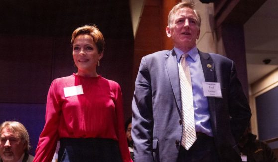 Kari Lake and Rep. Paul Gosar, both Arizona Republicans, stand together during the National Prayer Breakfast at the U.S. Capitol in Washington on Thursday.