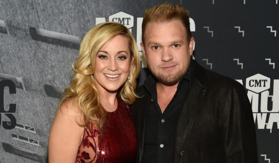 Country singer Kellie Pickler and her husband Kyle Jacobs are seen together in a file photo from 2017. Jacobs died Friday in what police are calling an apparent suicide.
