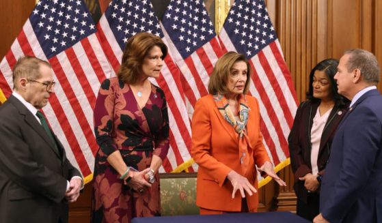 Rep. David Cicilline of Rhode Island, right, speaks with fellow Democrats, from left, Jerry Nadler of New York, Cheri Bustos of Illinois, Nancy Pelosi of California and Pramila Jayapal of Washington at the Capitol in D.C. on March 2, 2022.