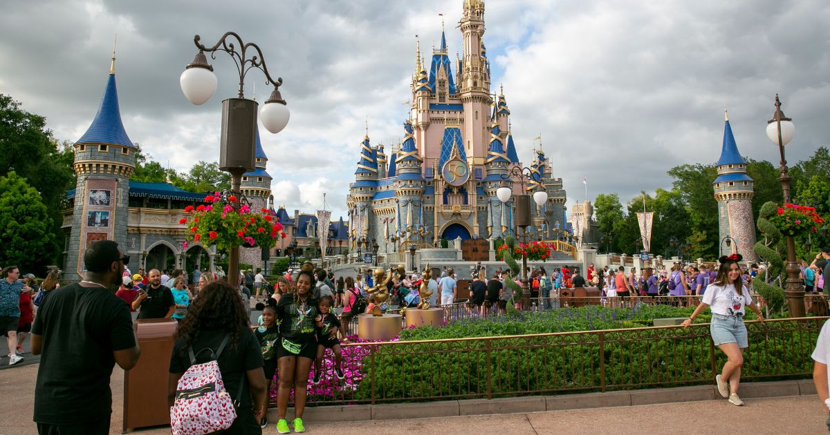 People visit Magic Kingdom Park at Walt Disney World Resort in Lake Buena Vista, Florida, on April 22, 2022.