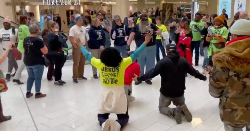A group of demonstrators, many wearing "Jesus Is The Only Way" shirts, gathered at the Mall of America on Saturday to show support for preacher Paul Shoro.