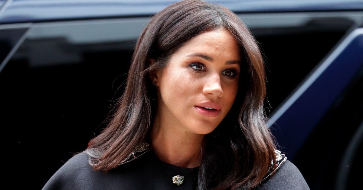 Meghan, Duchess of Sussex, arrives at the New Zealand House to sign a book of condolence on behalf of the royal family in London on March 19, 2019.