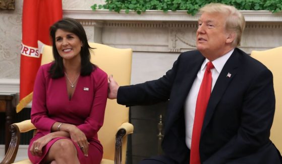 Then-President Donald Trump announces that he has accepted the resignation of Nikki Haley as U.S. ambassador to the United Nations in the Oval Office on Oct. 9, 2018, in Washington, D.C.