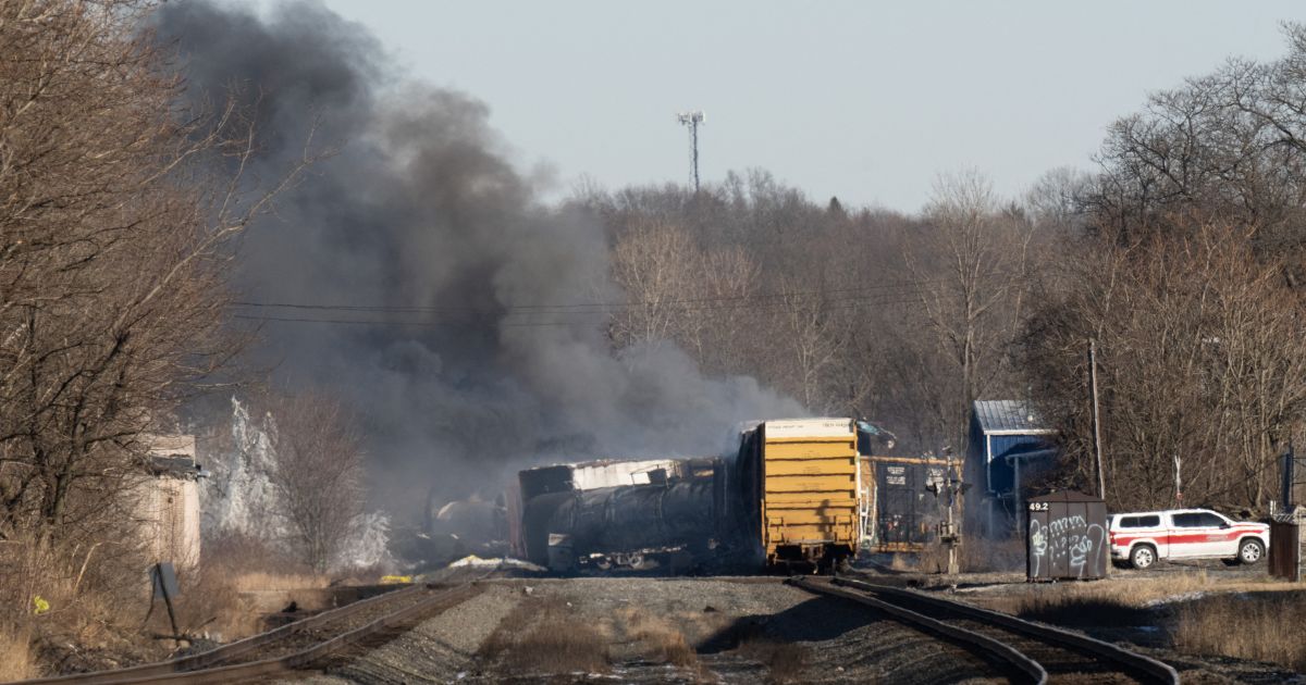 Smoke rises from a derailed cargo train in East Palestine, Ohio, on Feb. 4.