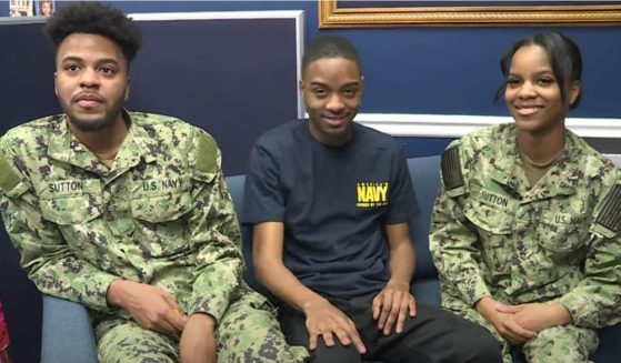 Triplets Ayrion Sutton, left, Adrion Sutton, middle, and Andrea Sutton, right, all decided to follow in their parents' footsteps and join the U.S. Navy.