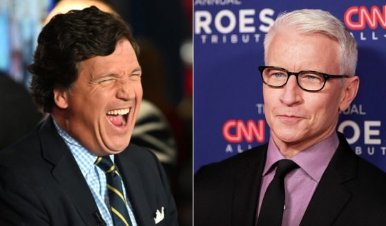 Fox News host Tucker Carlson, left, is dominating the ratings, while CNN's Anderson Cooper is watching his ratings sink.
