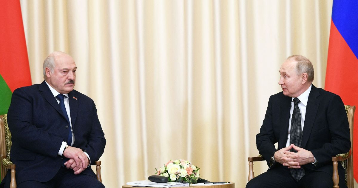 Russian President Vladimir Putin meets with his Belarusian counterpart, Alexander Lukashenko, in Moscow on Friday.