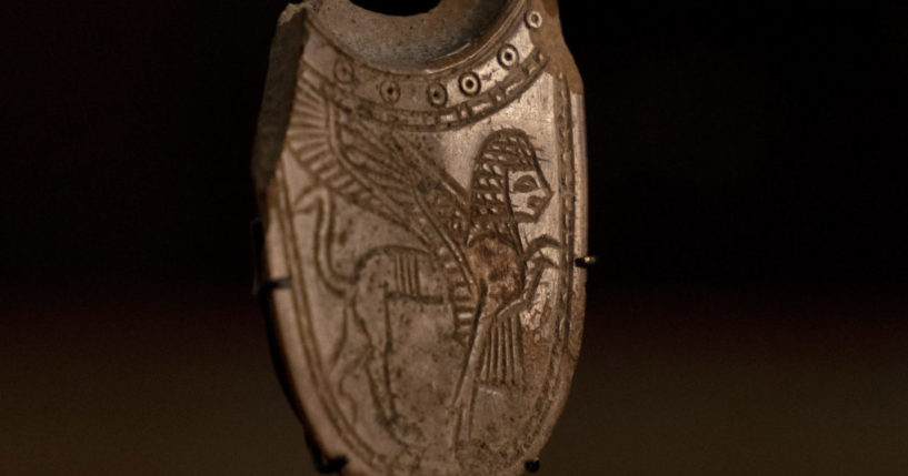 a 2,700-year-old ivory incense spoon