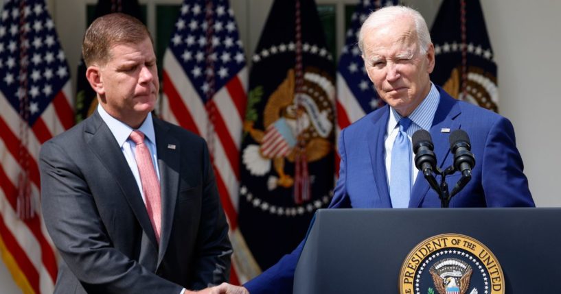 President Joe Biden shakes hands with Labor Secretary Marty Walsh during an event in the Rose Garden of the White House on Sept. 15, 2022, in Washington, D.C.