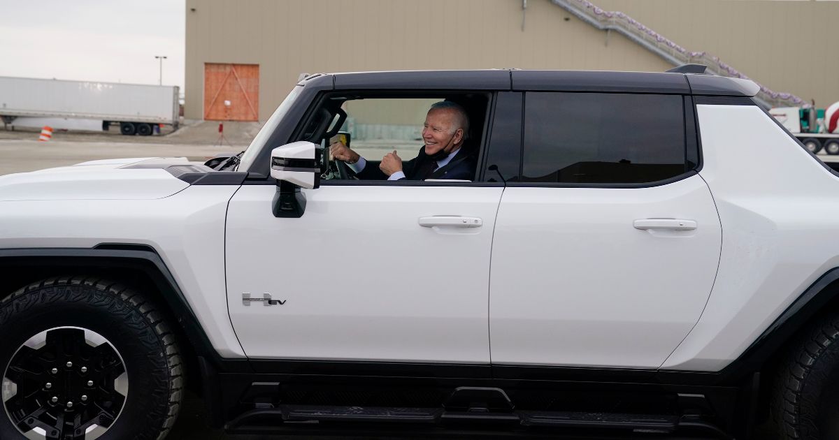 President Joe Biden test drives an electric Hummer at the General Motors Factory ZERO electric vehicle assembly plant in Detroit on Nov. 17, 2021.