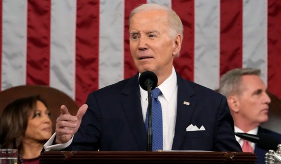 President Joe Biden delivers the State of the Union address Tuesday with Vice President Kamala Harris and House Speaker Kevin McCarthy in the background.
