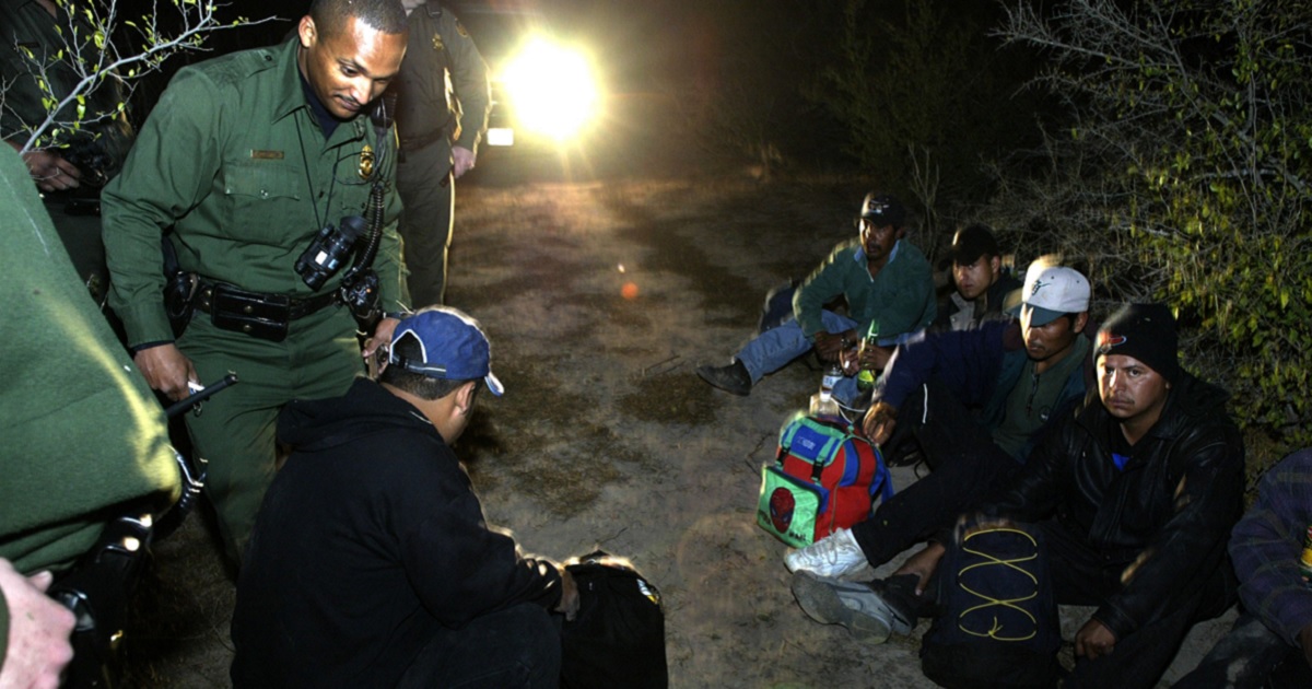 Illegal immigrants are detained by the Eagle Pass, Texas, Border Patrol just minutes after crossing the border from Mexico into Texas on Feb. 7.