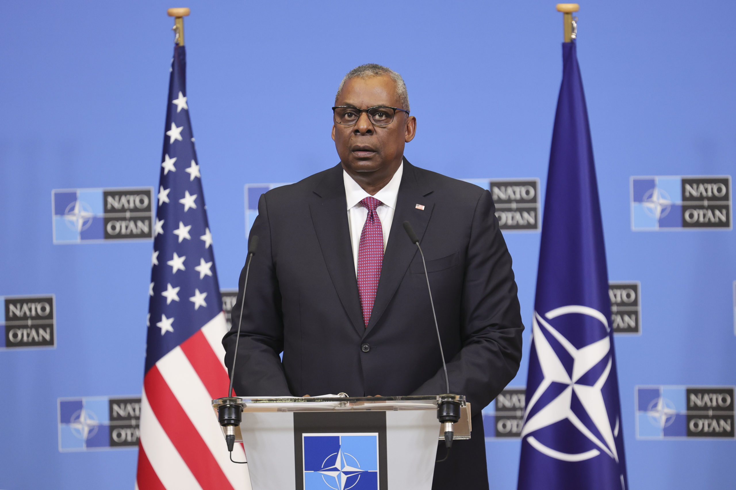 U.S. Secretary of Defense Lloyd Austin reads a statement following a NATO defense ministers meeting at NATO headquarters in Brussels, Wednesday.