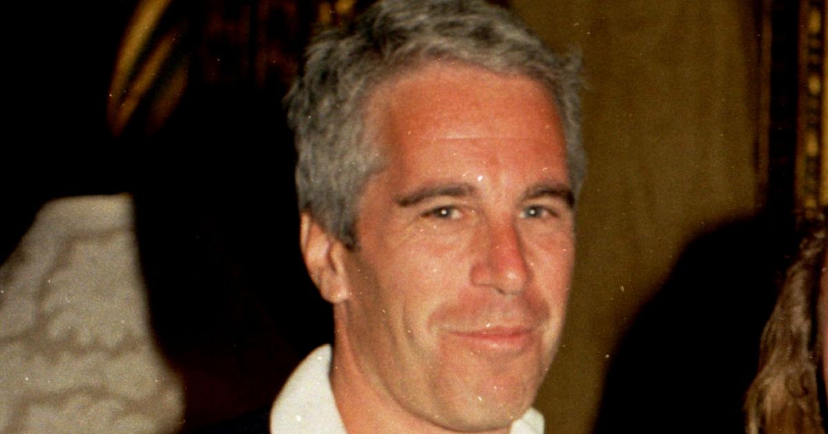 Jeffrey Epstein poses during a reception at the Mar-a-Lago estate, in Palm Beach, Florida, on March 19, 1995.