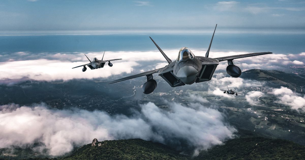 Fighter jets fly in this stock image.