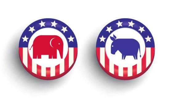 This stock photo depicts an elephant and donkey pin, representing the GOP and Democrats, respectively.