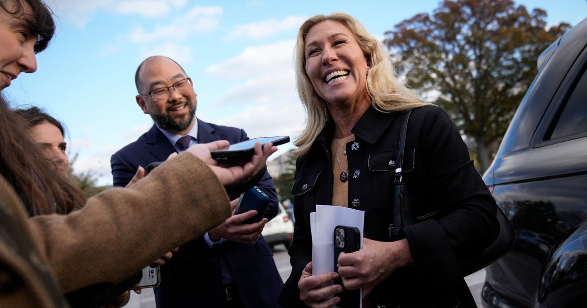 Rep. Marjorie Taylor Greene speaks to reporters as she leaves the U.S. Capitol after the last House votes of the week on Nov. 17, 2022, in Washington, D.C.