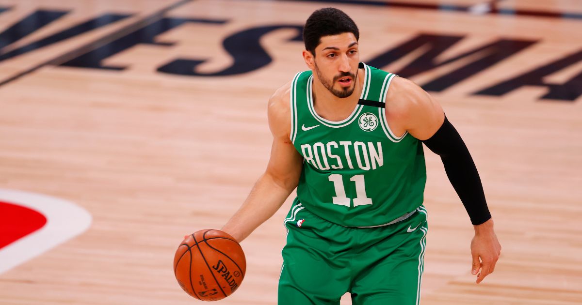 Enes Kanter Freedom #11 of the Boston Celtics handles the ball against the Portland Trail Blazers at The Arena at ESPN Wide World Of Sports Complex on Aug. 2, 2020, in Lake Buena Vista, Florida.