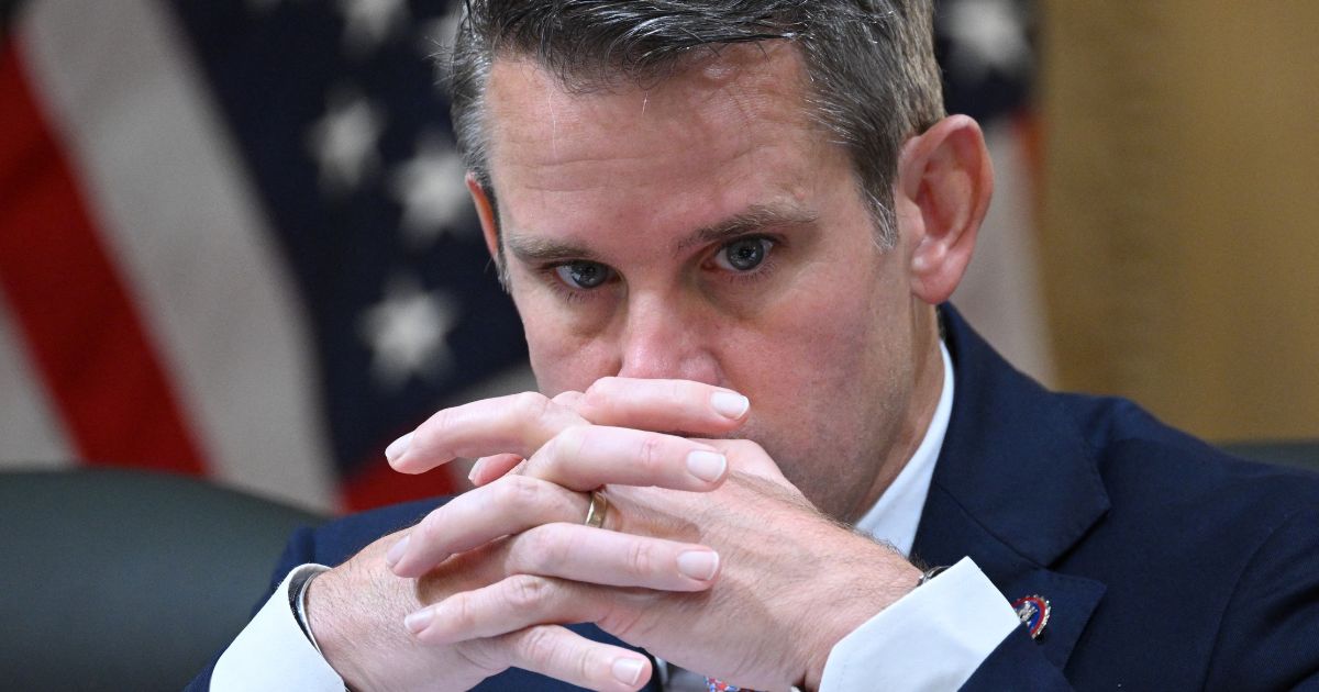 Representative Adam Kinzinger, Republican of Illinois, listens during a U.S. House Select Committee hearing on Capitol Hill in Washington, D.C., on Oct. 13, 2022.