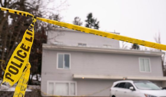 Police tape is seen at a home that is the site of a quadruple murder on Jan. 3 in Moscow, Idaho.