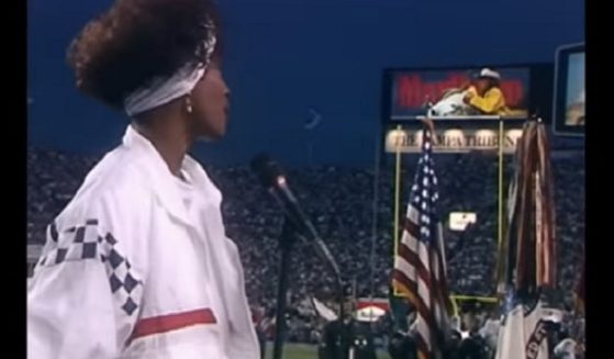 Superstar Whitney Houston performs "The Star-Spangled Banner" at the 1991 Super Bowl at Tampa Stadium in Tampa, Florida.
