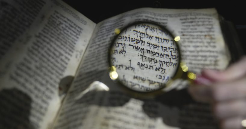 The Hebrew Bible "Codex Sassoon" is shown on display during a media preview of Sotheby's auction of the manuscript in London on Feb. 22.