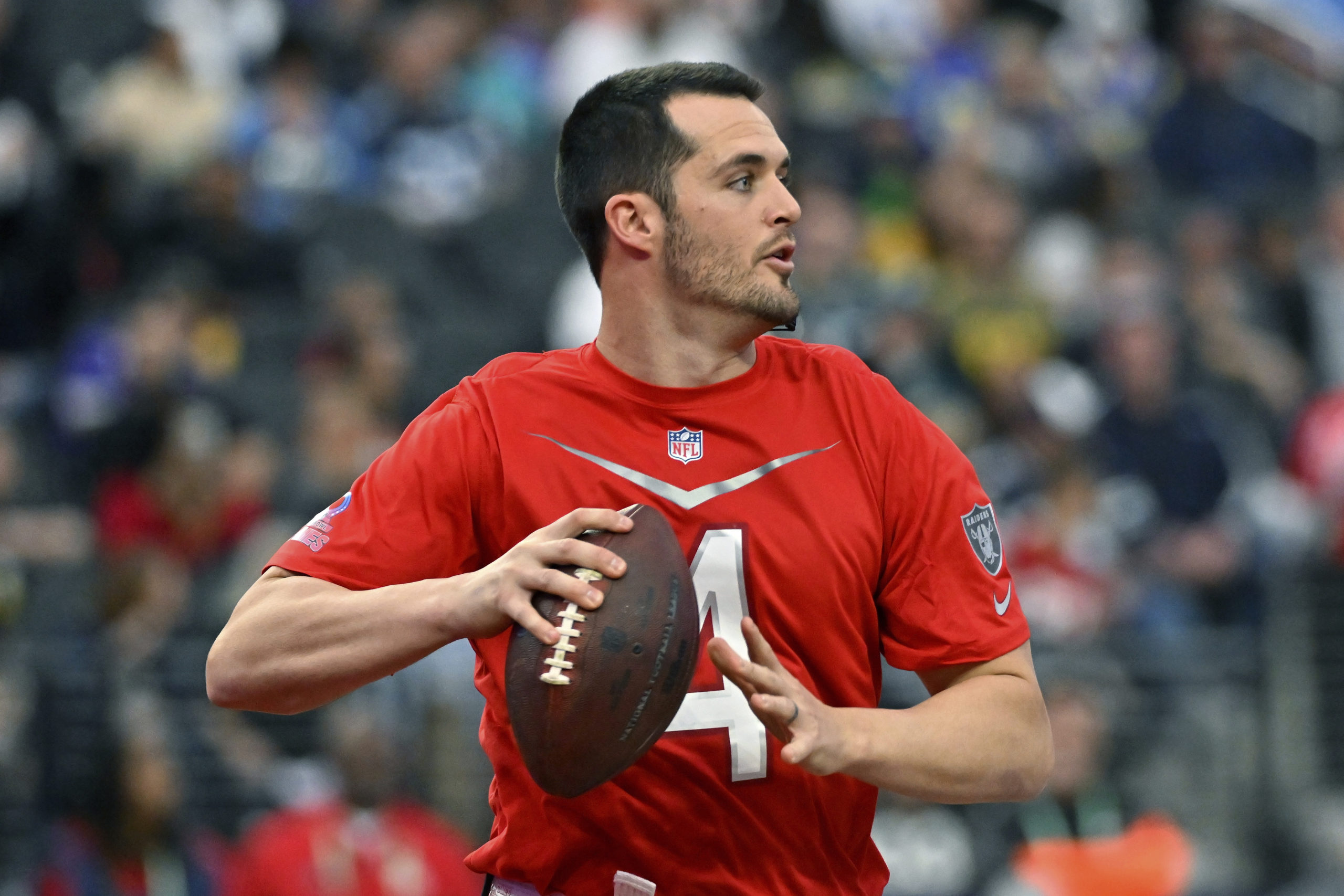 Quarterback Derek Carr looks to pass during a flag football event at the NFL Pro Bowl in Las Vegas on Feb. 5.