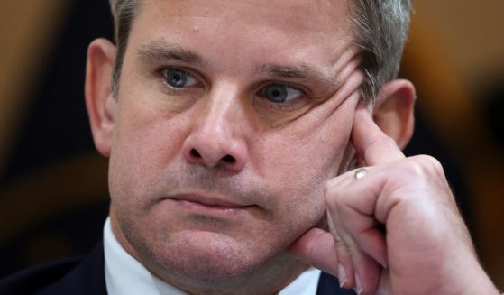 Then-Illinois Rep. Adam Kinzinger listens during a hearing in the Cannon House Office Building in Washington on July 21.