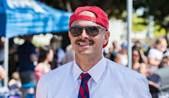 Richard Bailey, mayor of Coronado, California, marches in the city's Independence Day parade on July 4, 2022.