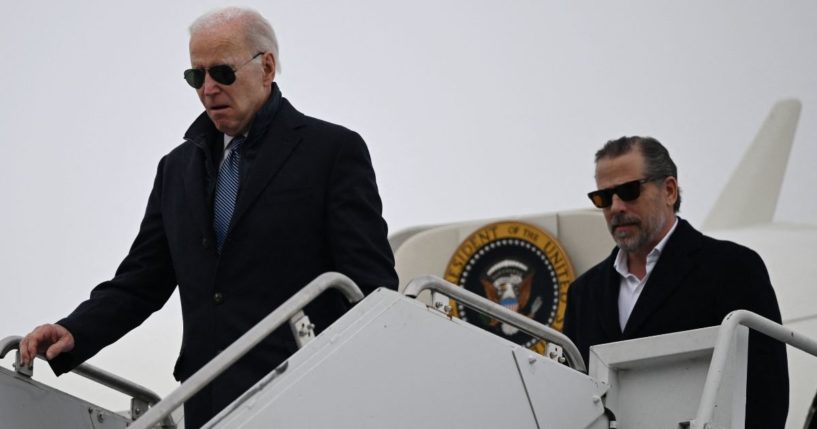 President Joe Biden, left, and son Hunter Biden arrive at Hancock Field Air National Guard Base in Syracuse, New York, on Feb. 4