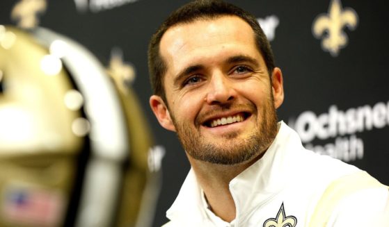 Quarterback Derek Carr speaks during a news conference In New Orleans, Louisiana, after signing a four-year contract with the New Orleans Saints on Saturday.