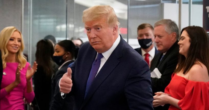 President Donald Trump gives a thumbs-up