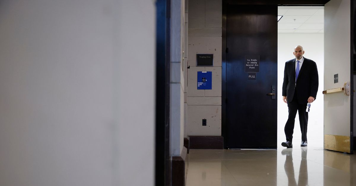 Sen. John Fetterman (D-PA) emerges from a closed-door, classified briefing for Senators at the U.S. Capitol on February 14, 2023 in Washington, DC.