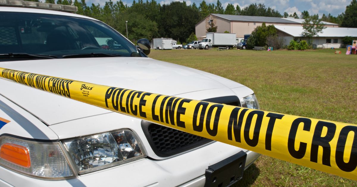 A Gainseville, Florida, police car is parked with police tape on Sept. 11, 2010.
