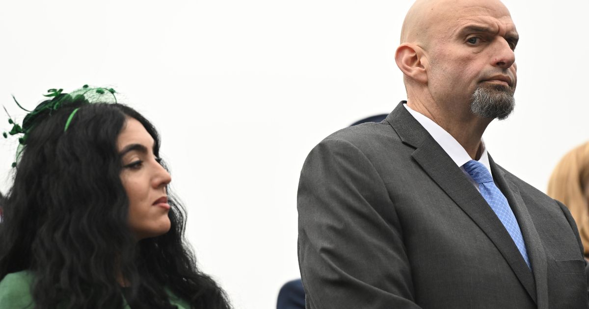 U.S. Sen. John Fetterman and his wife, Gisele Barreto Fetterman, attend the swearing-in of the governor of Pennsylvania on Jan. 17 in Harrisburg, Pennsylvania.
