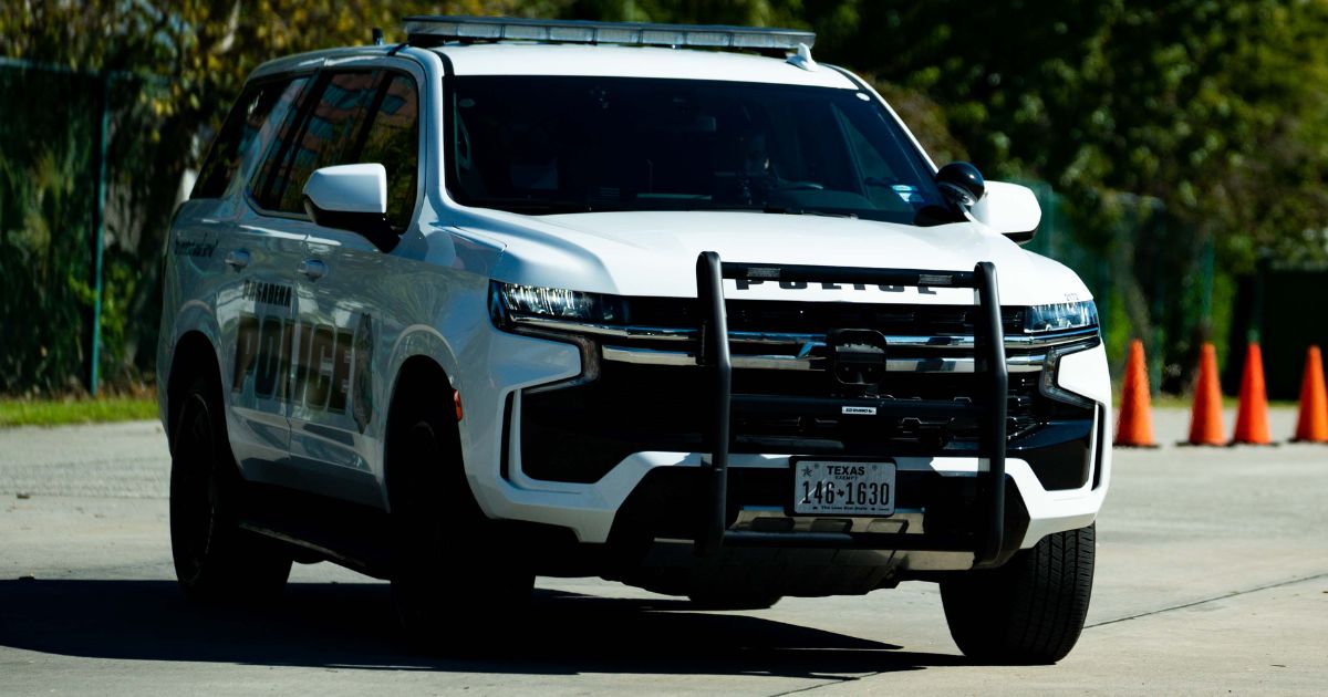 A police car is parked outside the AstroWorld festival in Houston, Texas on Nov. 6, 2021.