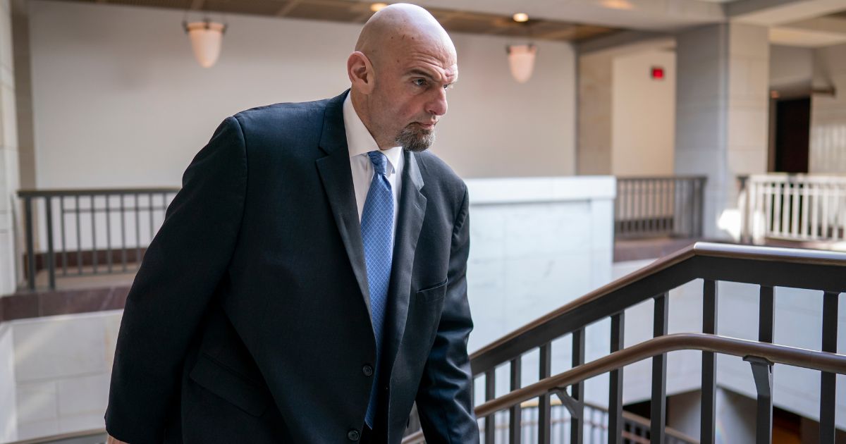 Sen. John Fetterman, D-Pa., seen leaving an intelligence briefing at the Capitol in Washington Feb. 14, remains hospitalized for depression.