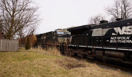 A Norfolk Southern train is traveling through East Palestine, Ohio, on Feb. 14. (Angelo Merendino / Getty Images)
