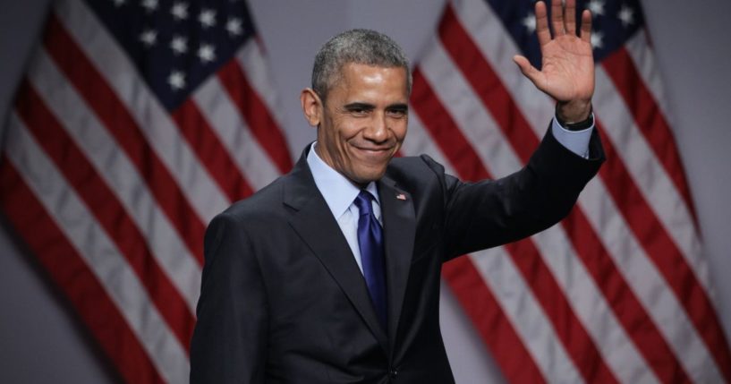Then-President Barack Obama waves after speaking on March 23, 2015, in National Harbor, Maryland.