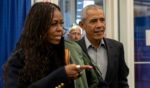 Former first lady Michelle Obama and former President Barack Obama arrive to cast their votes at an early voting venue in Chicago on Oct. 17.