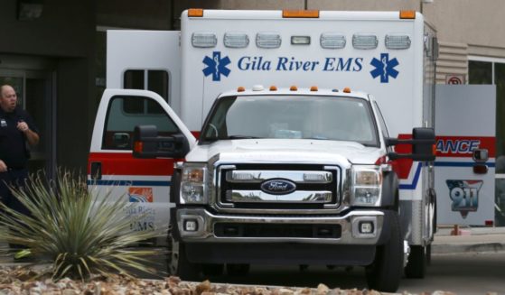 An ambulance is parked outside of a hospital emergency room in Phoenix, Arizona, on July 19, 2020.