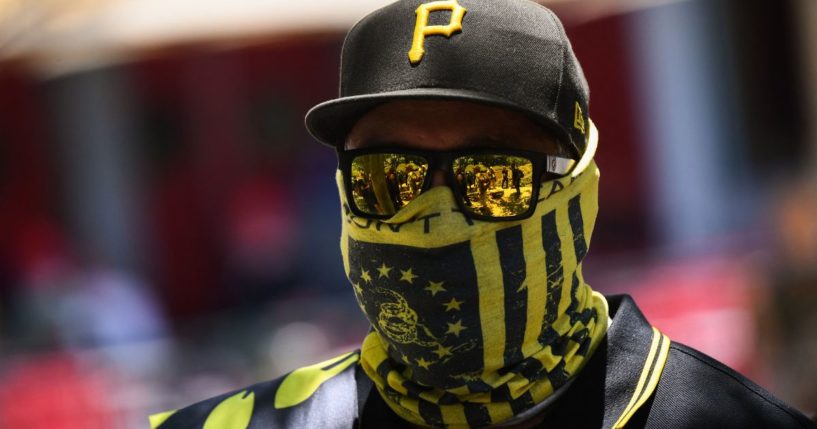 A counter protester wearing Proud Boys' insignia stands outside the NRA Annual Meeting in Houston, Texas, on May 28, 2022.