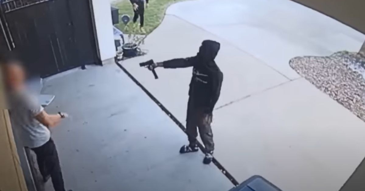 A video released by Houston police shows would-be car thieves confronting a homeowner at gunpoint.